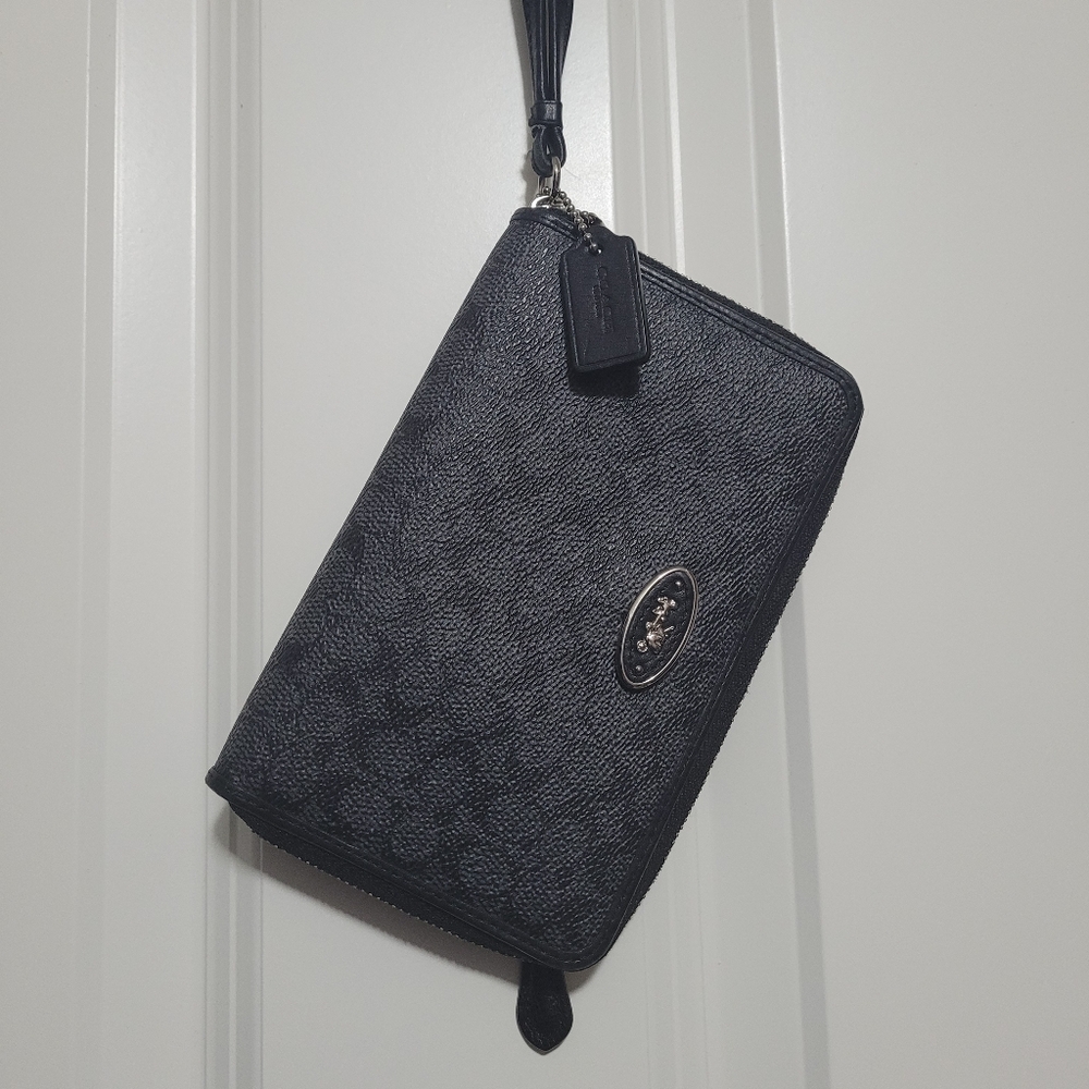 Coach Black Wallet with Textured Design and Wrist Strap
